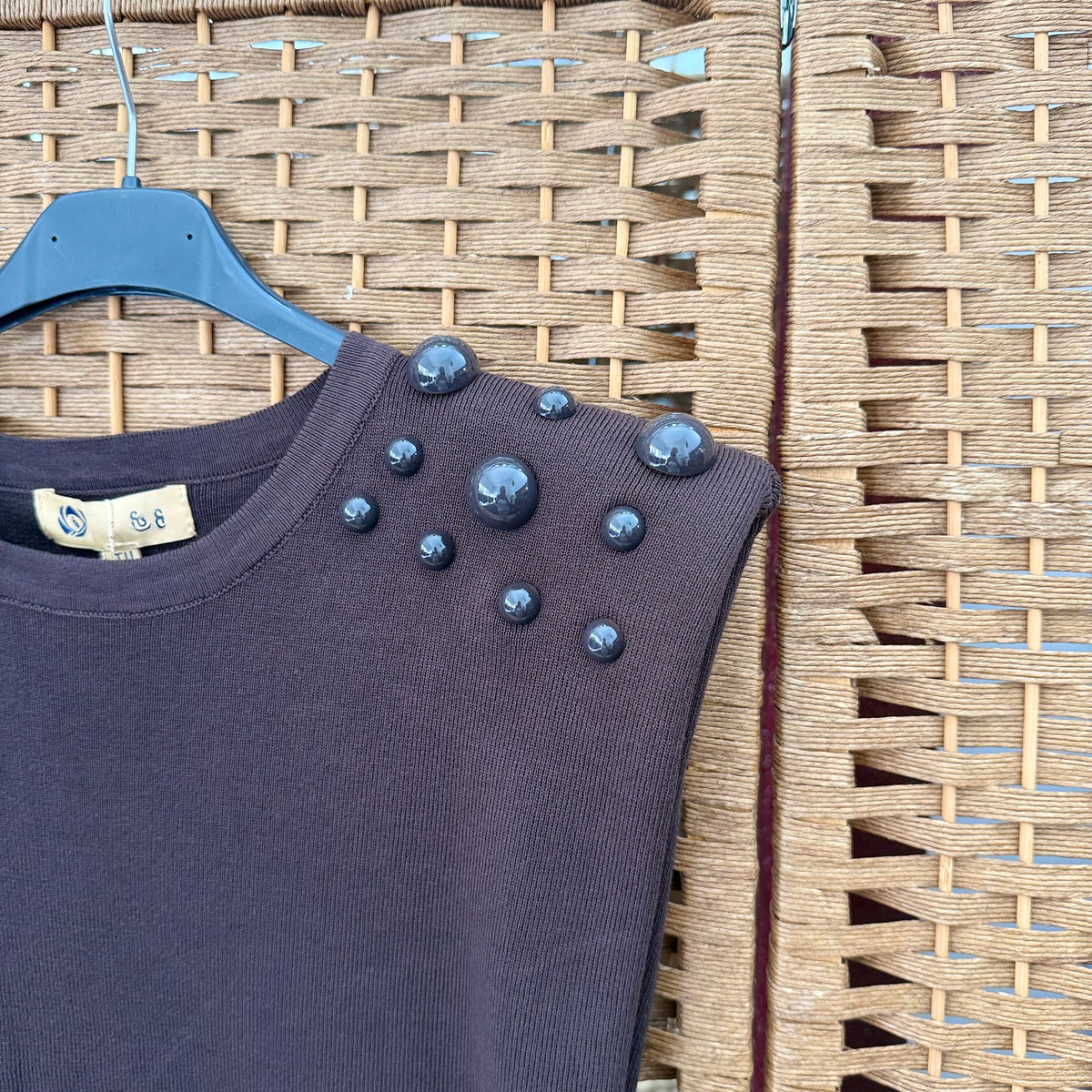 Beaded top with shoulder pads