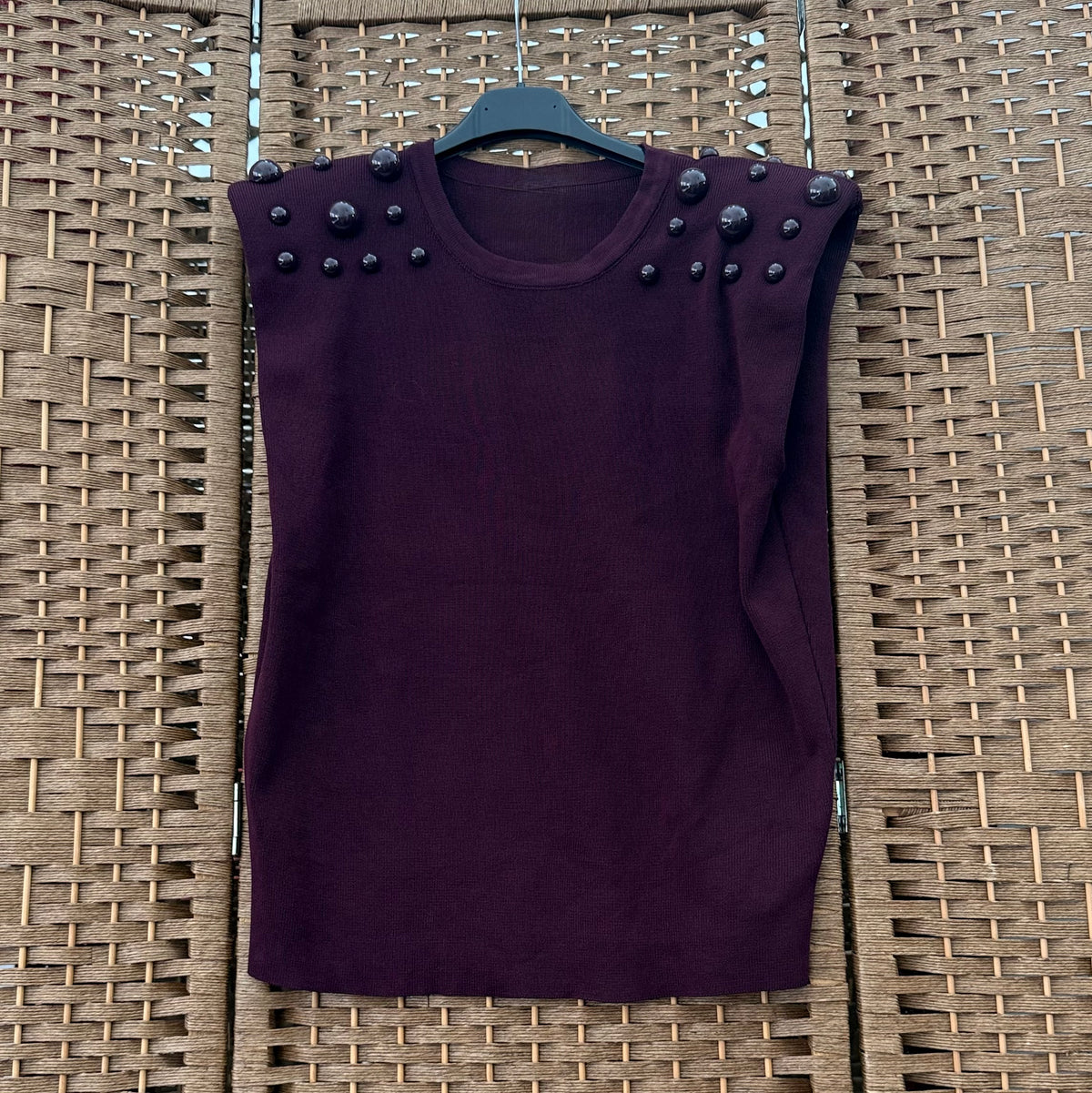 Beaded top with shoulder pads